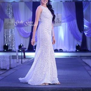 Long white/cream wedding dress.